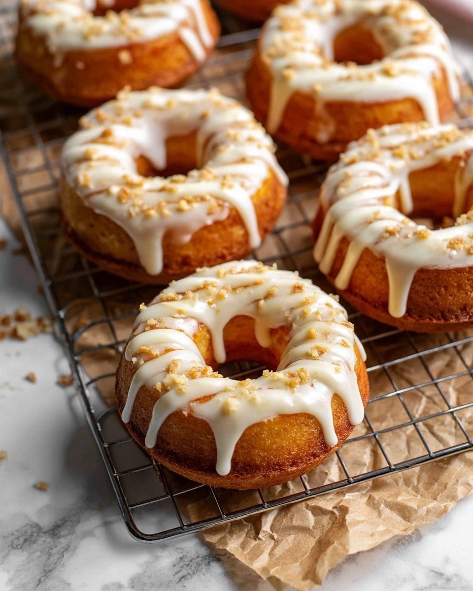 Pumpkin Spice Cheesecake Doughnuts Recipe - Recipe Image — Pumpkin Spice Cheesecake Doughnuts, pumpkin spice doughnut recipes, autumn dessert ideas, easy homemade doughnuts, cozy fall treats