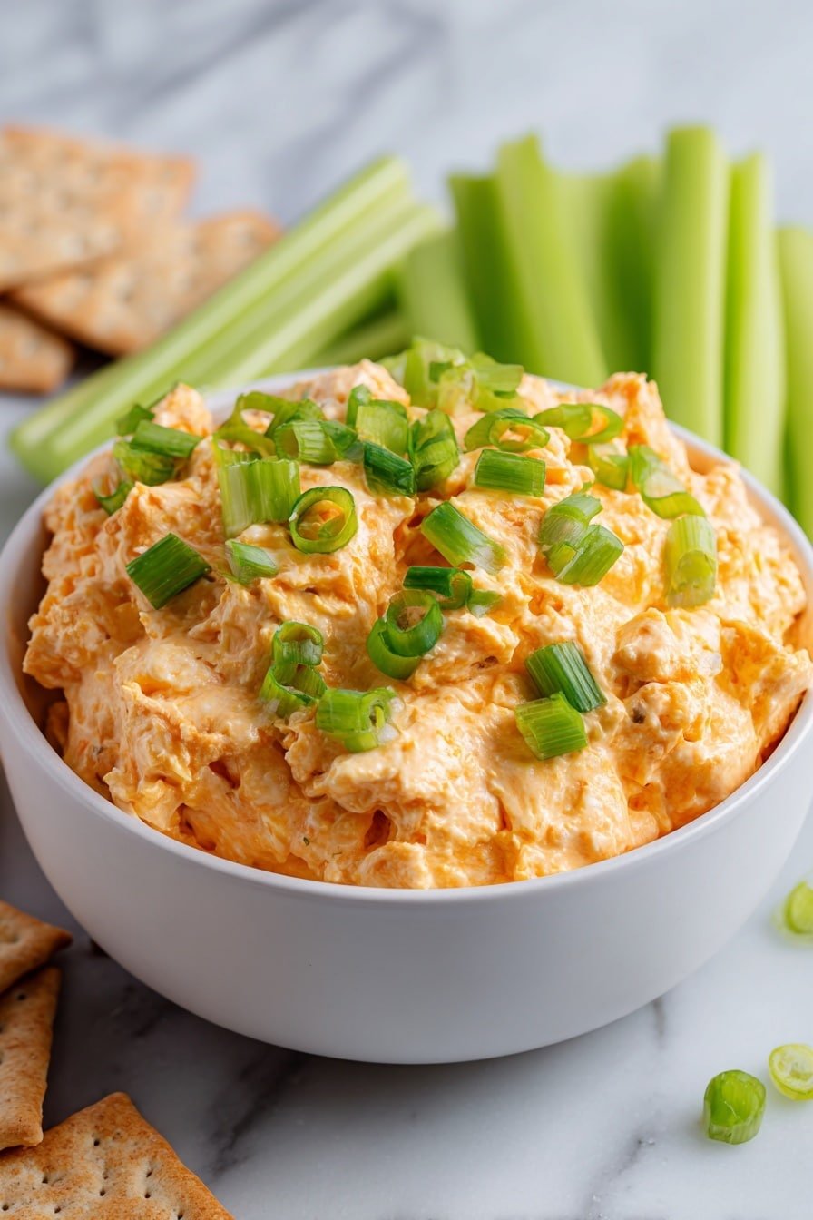 Crockpot Buffalo Chicken Dip Recipe - Article Image 1 — Crockpot Buffalo Chicken Dip, Buffalo Chicken Dip recipe, slow cooker buffalo dip, spicy buffalo chicken appetizer, cheesy buffalo chicken dip
