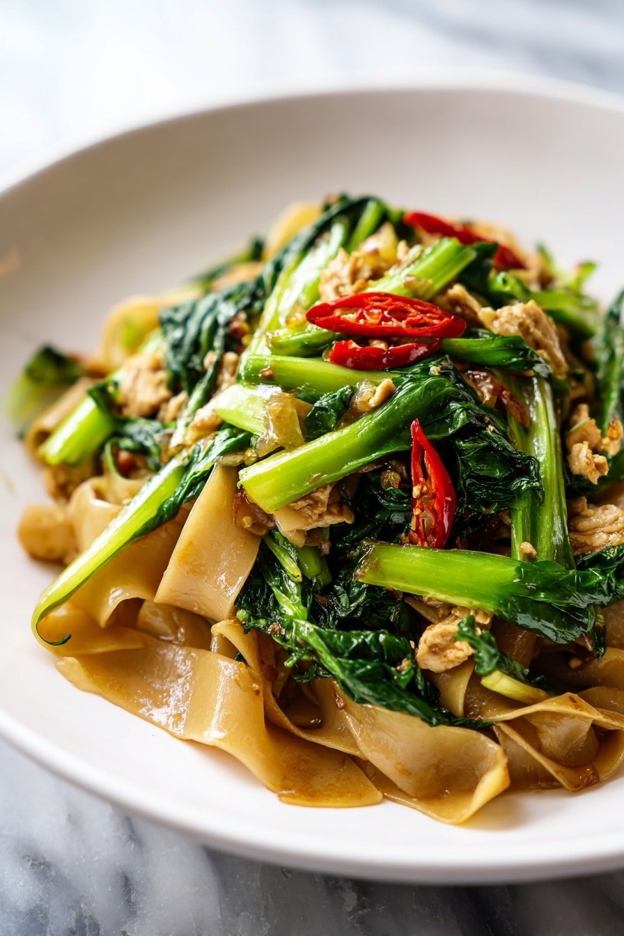 Quick Drunken Noodles Recipe - Article Image 2 — Quick Drunken Noodles, Thai stir-fry recipes, easy noodle dishes, spicy chicken and vegetable stir-fry, quick weeknight dinners