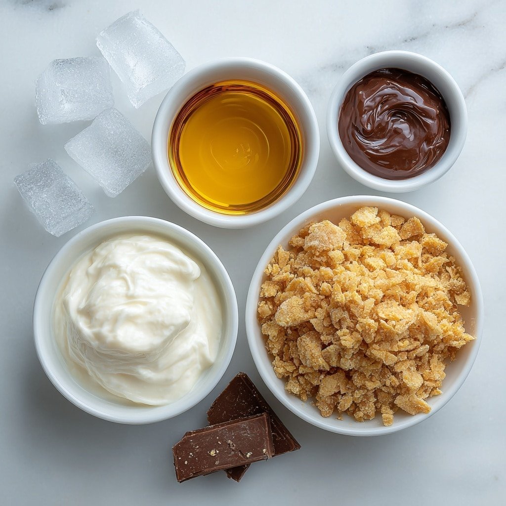 Liquid Butterfinger Cocktail Recipe - Ingredients Image — Liquid Butterfinger Cocktail, Butterfinger cocktail recipe, indulgent dessert cocktails, easy butterfinger drink, creamy chocolate cocktail