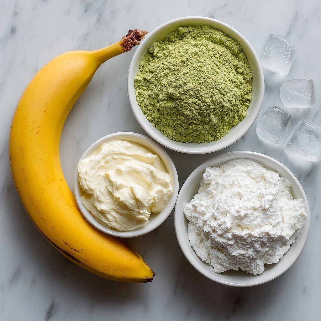 Banana Matcha Smoothie Recipe - Ingredients Image — Banana Matcha Smoothie, healthy smoothie recipes, green tea banana drink, easy smoothie ideas, refreshing breakfast smoothies