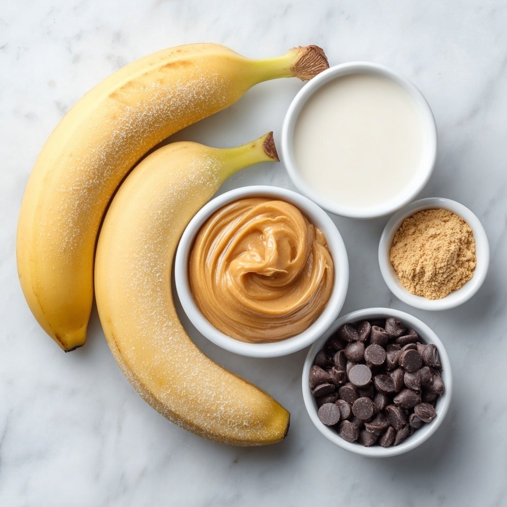 Chunky Monkey Banana Smoothie Recipe - Ingredients Image — Chunky Monkey Banana Smoothie, healthy banana smoothie with peanut butter and chocolate chips, quick and easy breakfast smoothie, creamy banana smoothie recipes, energizing fruit smoothies