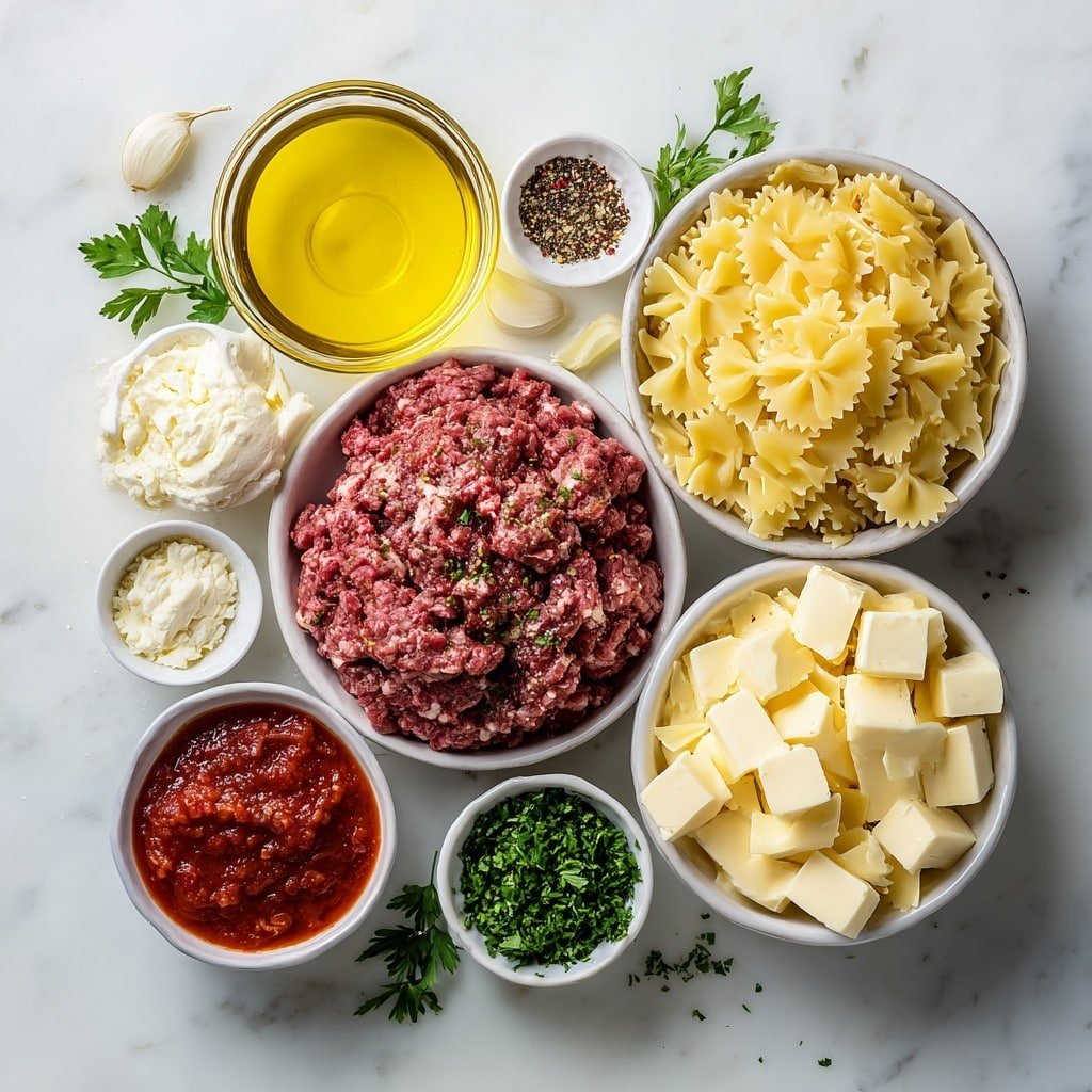 Creamy Velveeta Beef Bowtie Pasta Recipe - Ingredients Image — Creamy Velveeta Beef Bowtie Pasta, creamy pasta with beef and Velveeta, easy cheesy beef pasta, weeknight bowtie pasta dish, comforting pasta with Velveeta