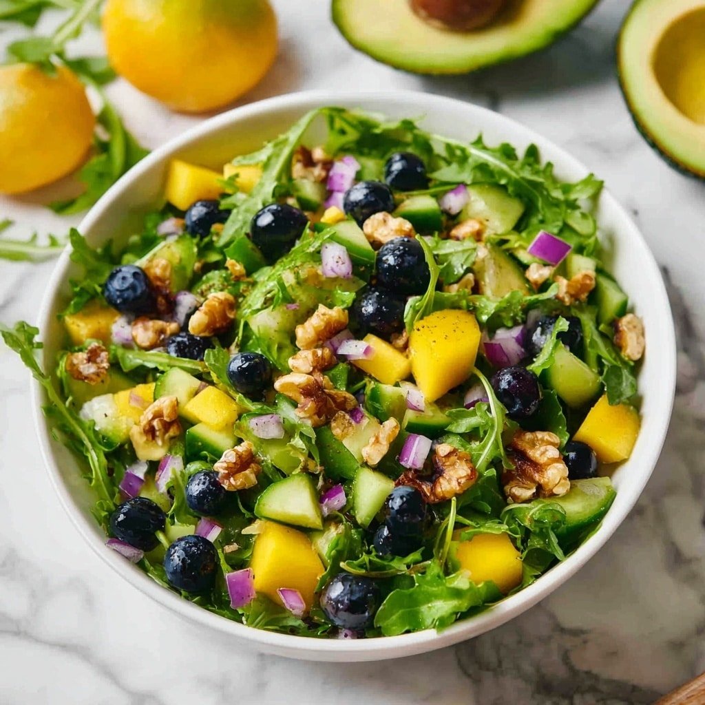 Fresh Mango Cucumber Salad with Blueberries Recipe - Article Image 1 — Fresh Mango Cucumber Salad with Blueberries, Mango Cucumber Blueberry Salad, Summer Fruit Salad with Mango and Blueberries, Healthy Mango Cucumber Salad, Refreshing Blueberry Mango Side Dish