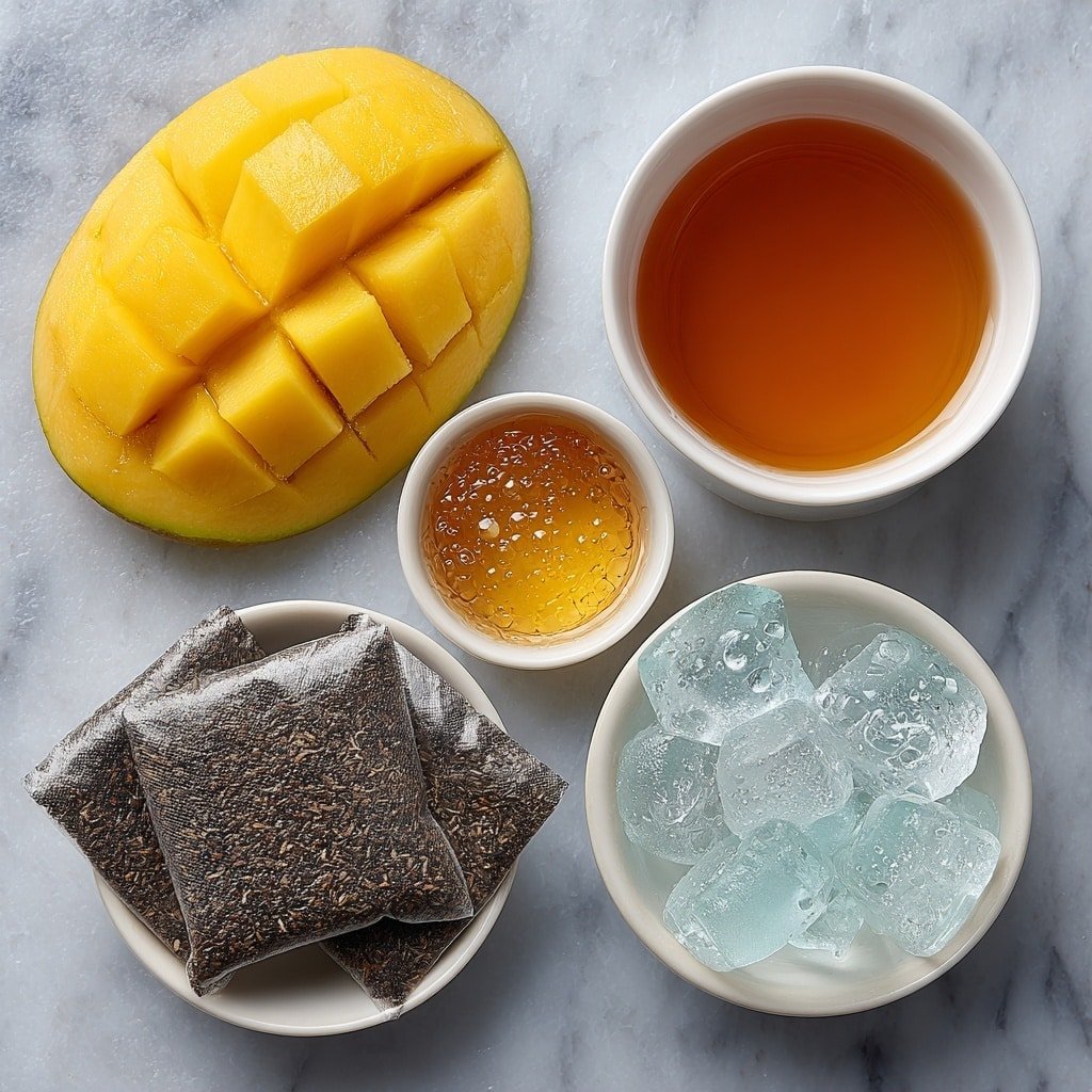 Flat lay of two dry black tea bags, one whole ripe mango with bright yellow-orange skin, a small white ceramic bowl of golden honey, a small white ceramic bowl filled with clear ice cubes, and a small white ceramic bowl of fresh water droplets placed on a clean white marble surface, soft natural light, photo taken with an iPhone, professional food photography style, fresh ingredients, white ceramic bowls, no bottles, no duplicates, no utensils, no packaging --ar 1:1 --v 7 --p m7354639359234015250 — Mango Iced Tea, Mango Iced Tea Recipe, Tropical Iced Tea, Refreshing Mango Drink, Easy Mango Iced Tea